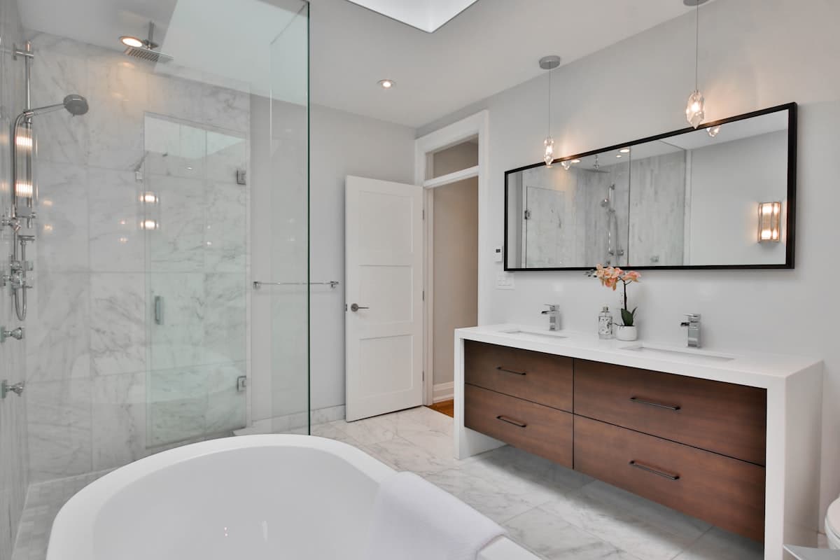 Heated Bathroom Floors 2026: Electric vs. Hydronic (And Which to Choose)